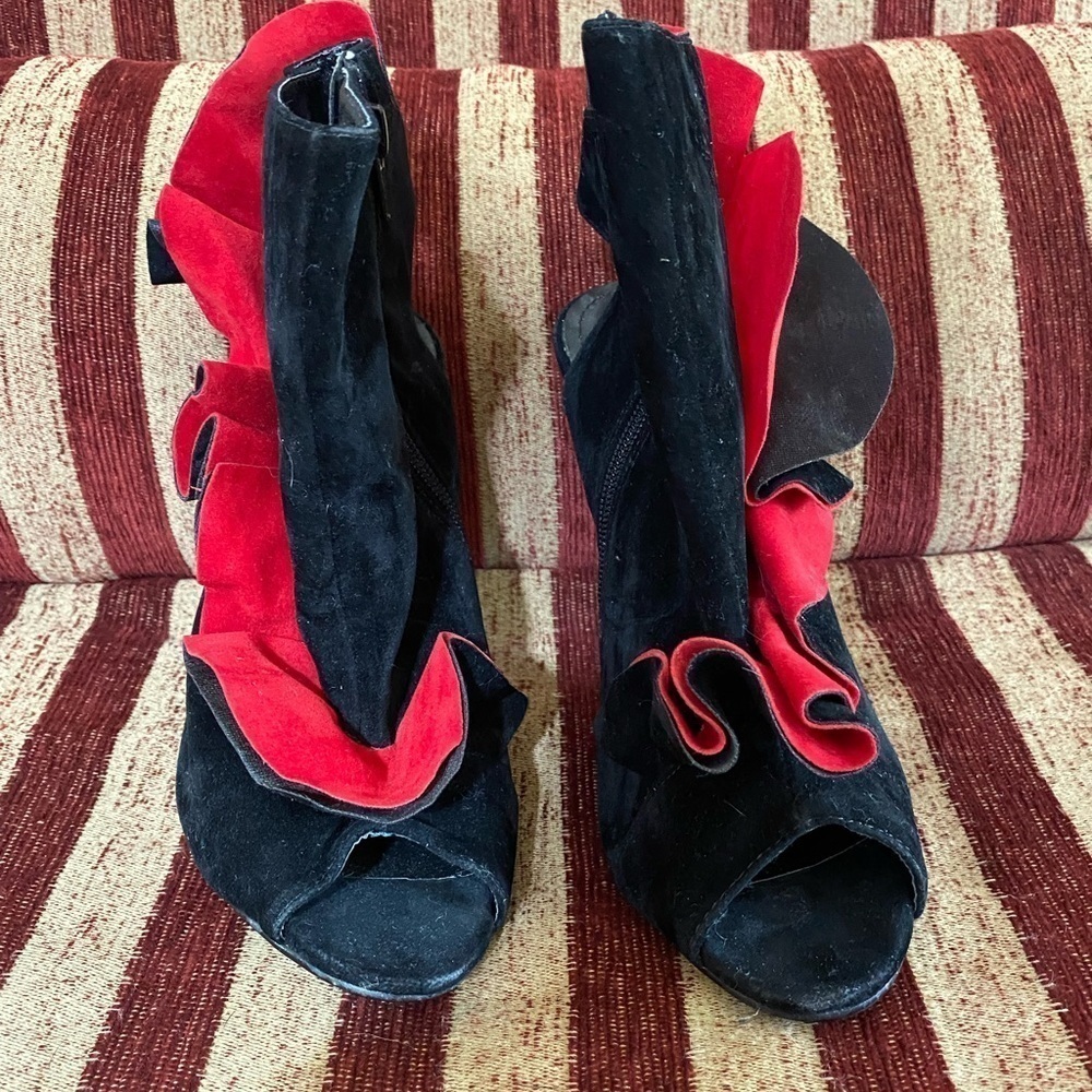 Black peek a boo heels with open heel and red and black ruffle size 71/2